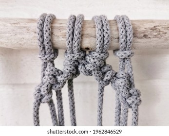 A Front-view Of Crochet Grey Cotton Yarn Wall Hanging In The Making Process