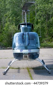 front-view helicopter parked in parking lot