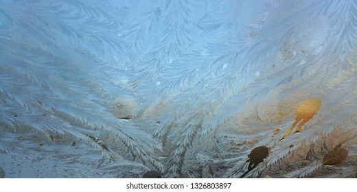 Frost Flowers Looking Like Feathers On A Window Windscreen Car In Winter