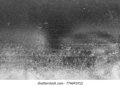 Frost On Car Rear Window In Black And White. Seasonal Background And Texture