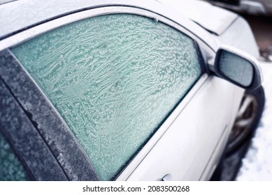 Frost On Side Car Window. Frozen Car At Parking Lot. Frost On Car Windows, Frosted Glass. Selective Focus