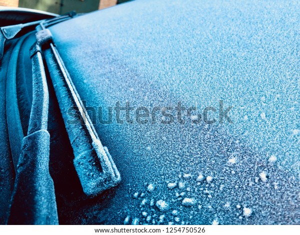 Frost on Wind screen of\
Car