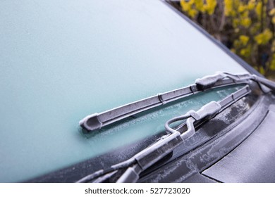 Frost On Windscreen And Wipers Of A Car