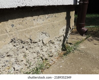           Frost-damaged Concrete Foundation Of A House