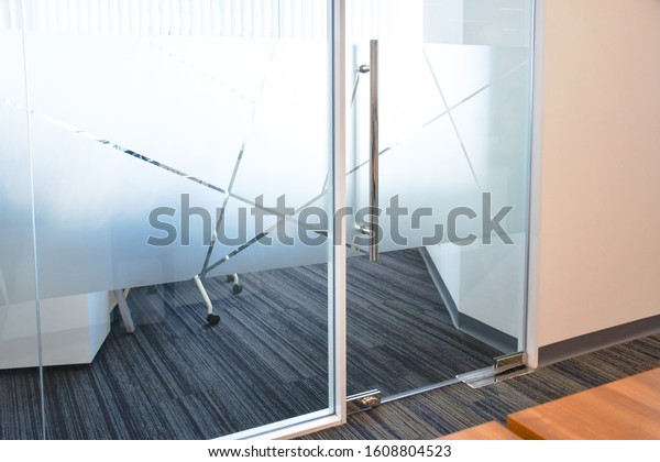 Frosted film glass sticker\
cut in pattern, Glass Film Design, Privacy in work place, Modern\
office meeting room or manager room concept. Glass wall idea for\
interior.