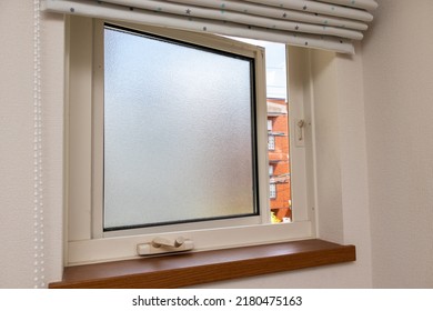 Frosted Glass Window In A Slightly Opened State