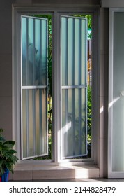 Frosted Glass Window And White Window Frame