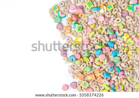Frosted toasted oat cereal with fun shaped marshmallows on white background. blank space for texts.