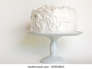 Frosted White Cake On Stand