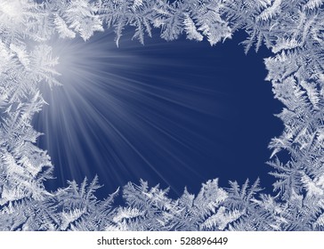 Frosty Ice Border Pattern On Dark Blue With Light Rays