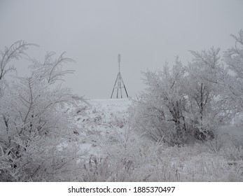 Frosty Triangulation Station On The Mountain Top.