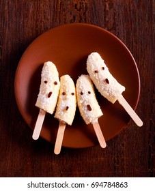 Frozen Banana Ghosts Dessert On Plate, Top View