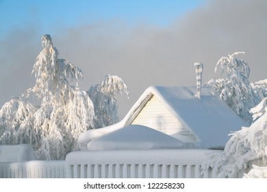 The Frozen And Become Covered With Hoarfrost Rural House In A Strong Frost, Russia, Siberia