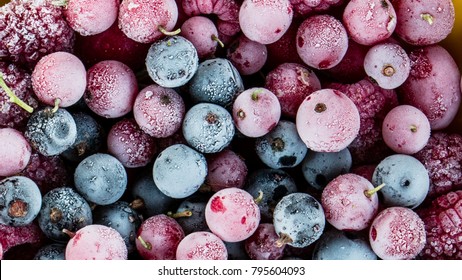 frozen berries, black currant, red currant, raspberry, blueberry. top view. macro