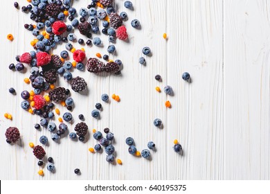 Frozen Berries On White Background Overhead Shot