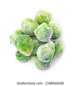 Frozen brussel sprouts on white background. Vegetable preservation
