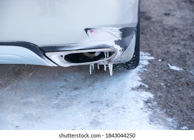 Frozen Car, Exhaust Pipe With Icicles, Rear View, Snow, Ice, Winter