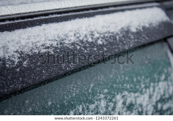 frozen car glass, car glass in ice with snow,\
frost, snowfall