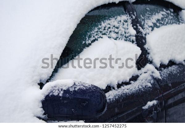 frozen car glass, car glass in ice with snow,\
frost, snowfall