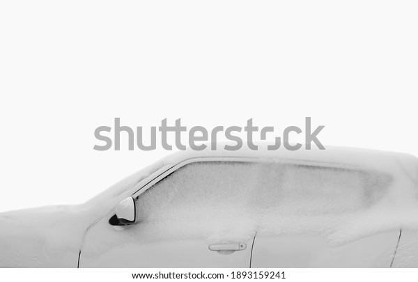 Frozen car side\
window in snow,  glass background. Snow covered frozen car covered\
with snow. Winter road. Danger of winter driving. Car snow removal.\
Dangerous traffic\
situation.