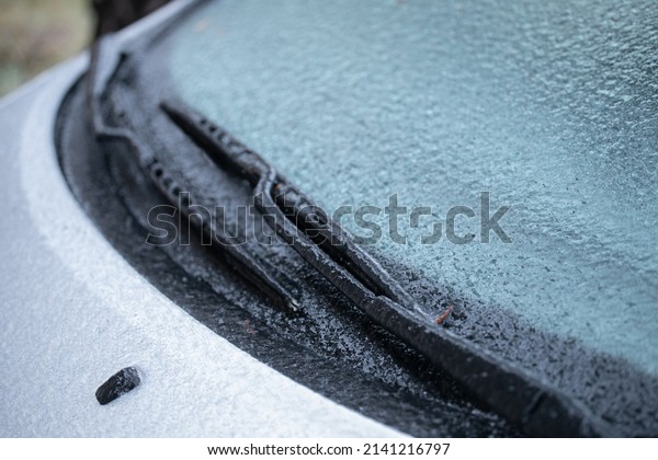 frozen car\
windows, auto glass after a freezing rain ,how to unfreeze, de-ice\
car windows in cold weather in\
winter