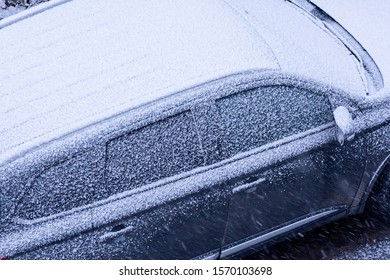 Frozen car windows. Concept: winter and frost, cooling.