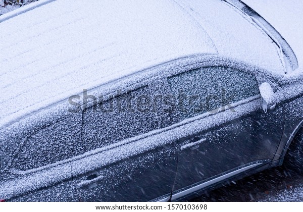 Frozen\
car windows. Concept: winter and frost,\
cooling.