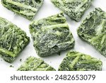 Frozen Catalonia Chicory cubes,vegetables on white plate,high angle view,macro close-up.