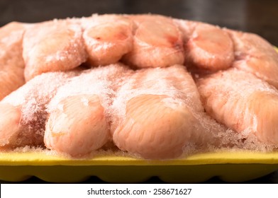 Frozen Chicken Wings Covered With Ice