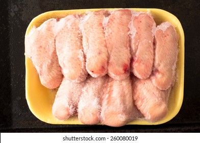 Frozen Chicken Wings Covered With Ice