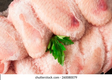 Frozen Chicken Wings Covered With Ice