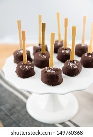 Frozen Chocolate Covered Banana Slices With Party Forks