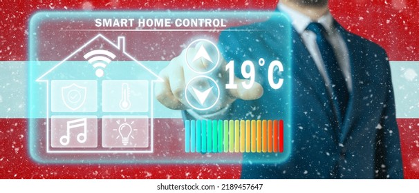 Frozen Citizen Of Austria Adjusting Heating Temperature On A Virtual Screen Of Smart Home Controller, Winter Blizzard Background. Concept Of Forced Thrift Because Increased Price For Heating Home.