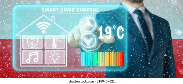 Frozen Citizen Of Poland Adjusting Heating Temperature On A Virtual Screen Of Smart Home Controller, Winter Blizzard Background. Concept Of Forced Thrift Because Increased Price For Heating Home.