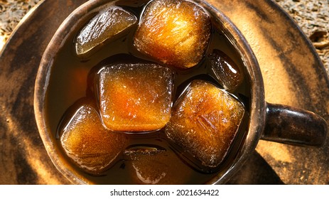 Frozen Coffee In Cubes Close-up, Top View. Macro, Trend Coffee Ice Discs.Coffee Convenience