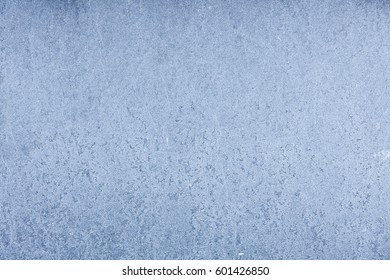 Frozen cold granite stone wall texture background