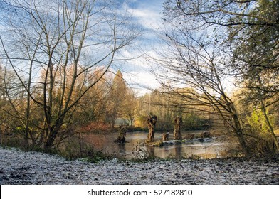 Frozen And Colorful British Park Landscape With Frozen Lawn And Frosty Lake. Lido Park, Droitwich Spa, England, United Kingdom