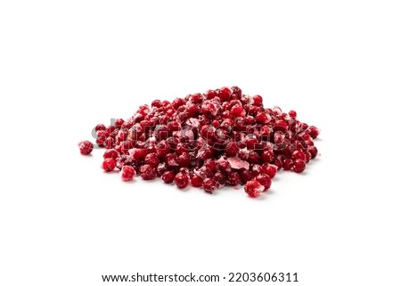 Frozen cowberry isolated. Iced lingonberry pile, frosty red berries, frozen whortleberry heap, mountain cranberry, partridgeberry, frosted bearberries on white background side view