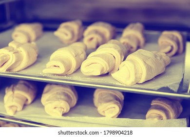 Frozen Croissants In Proofing Chamber Shot In Bakery, Toned