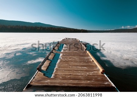 Frozen Dock Winter Lake of the Woods Oregon