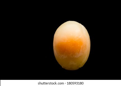 Frozen Egg On Black Background