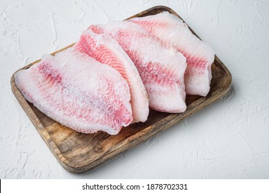 Frozen fish fillet, on white background - Shutterstock ID 1878702331