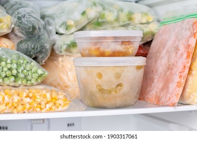 Frozen Food In The Freezer. Frozen Vegetables, Soup, Ready Meals In The Freezer