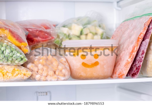 Frozen food in the freezer. Frozen vegetables,\
soup, ready meals in the\
freezer
