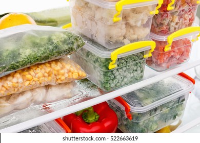 Frozen food in the refrigerator. Vegetables on the freezer shelves. Stocks of meal for the winter. - Shutterstock ID 522663619