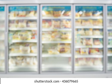 Frozen Food In Supermarket Freezer Blurred Background