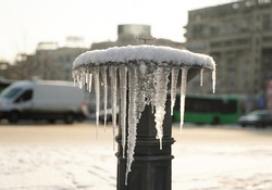 
Frozen Fountain, Cakes Covering A Fountain In The Cold Season In The Romanian Capital, Bucharest.