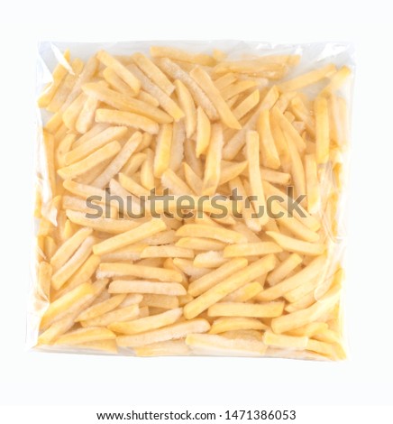 Frozen french fries in plastic bag, clipping path.