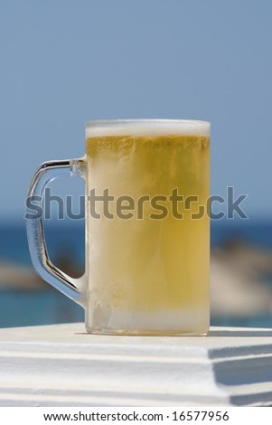 Frozen glass with light beer