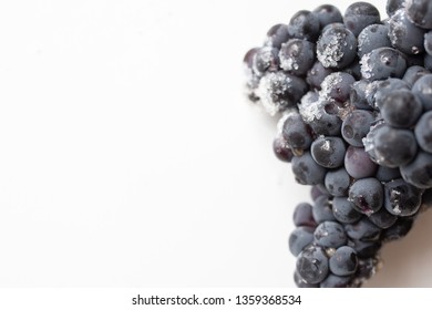 Frozen Grapes On A White Table